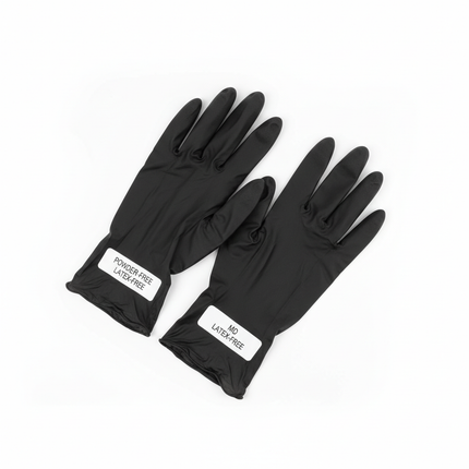 Black vinyl gloves medium size laid flat