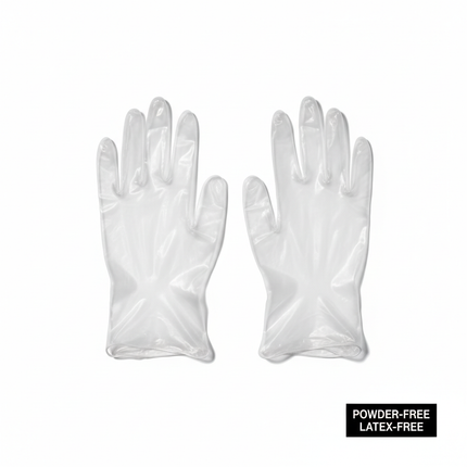 Clear vinyl gloves medium size laid flat